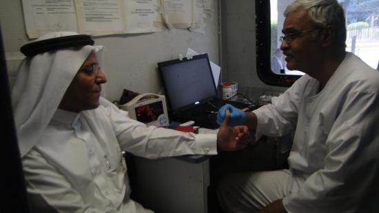 Samer ALRayyan delivers the donation of Ramadan campaign that SAIB did on FB page to Tariq aleshewi Director of Ensan